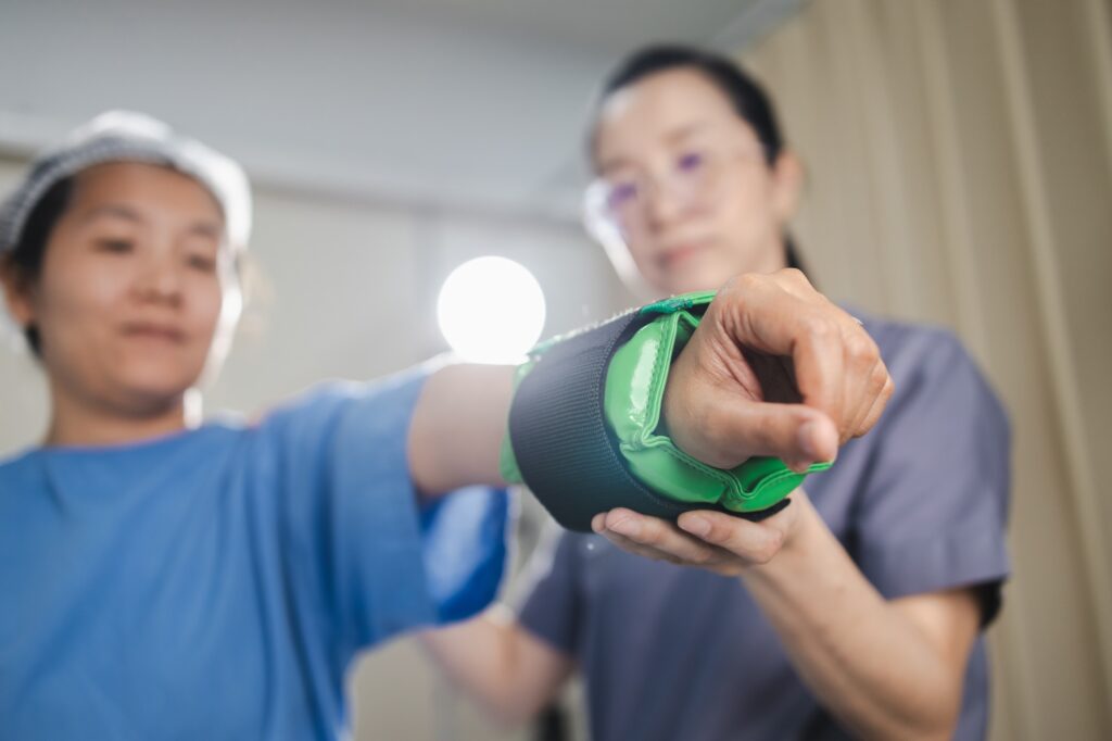 Physical therapy, healthcare professional demonstrates physical therapy